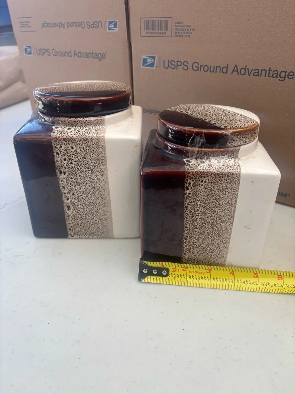 Pier 1 Two-Tone Brown and White Ceramic Canister Pair